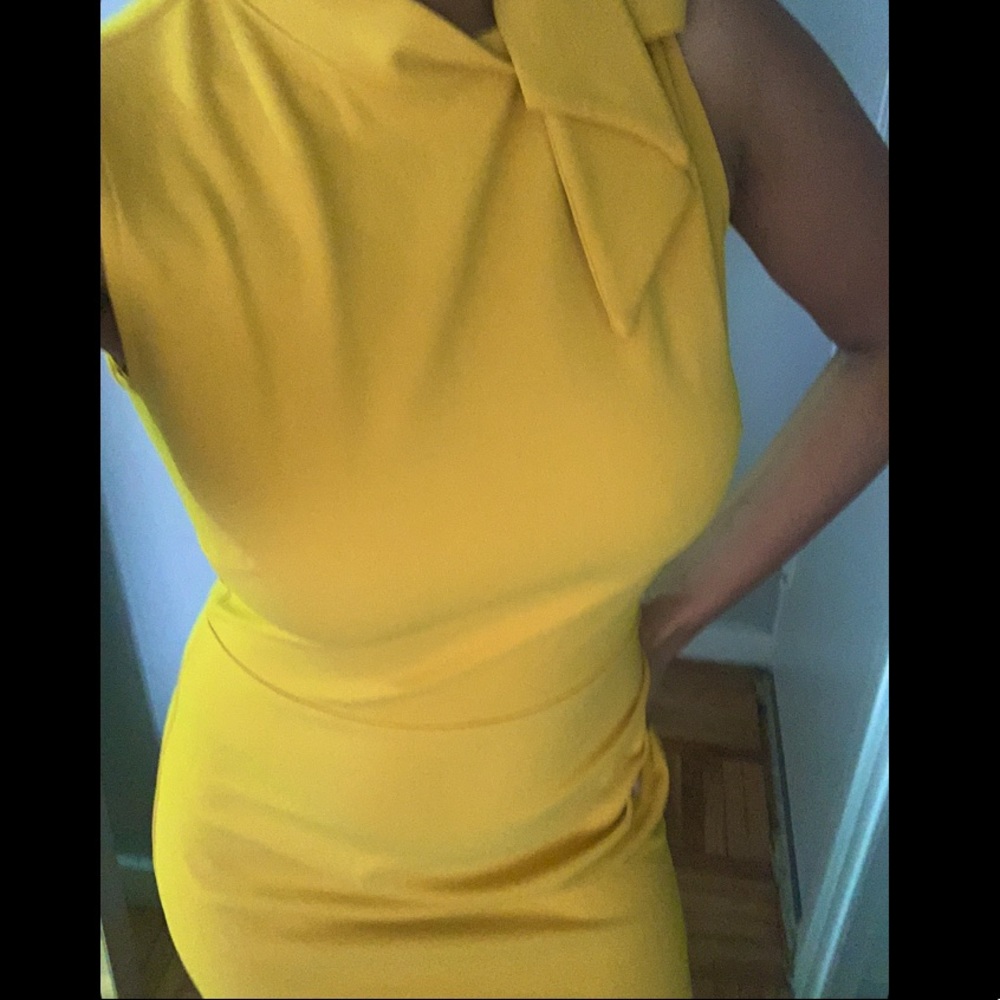 Beautiful classy mustard midi dress. Never worn.